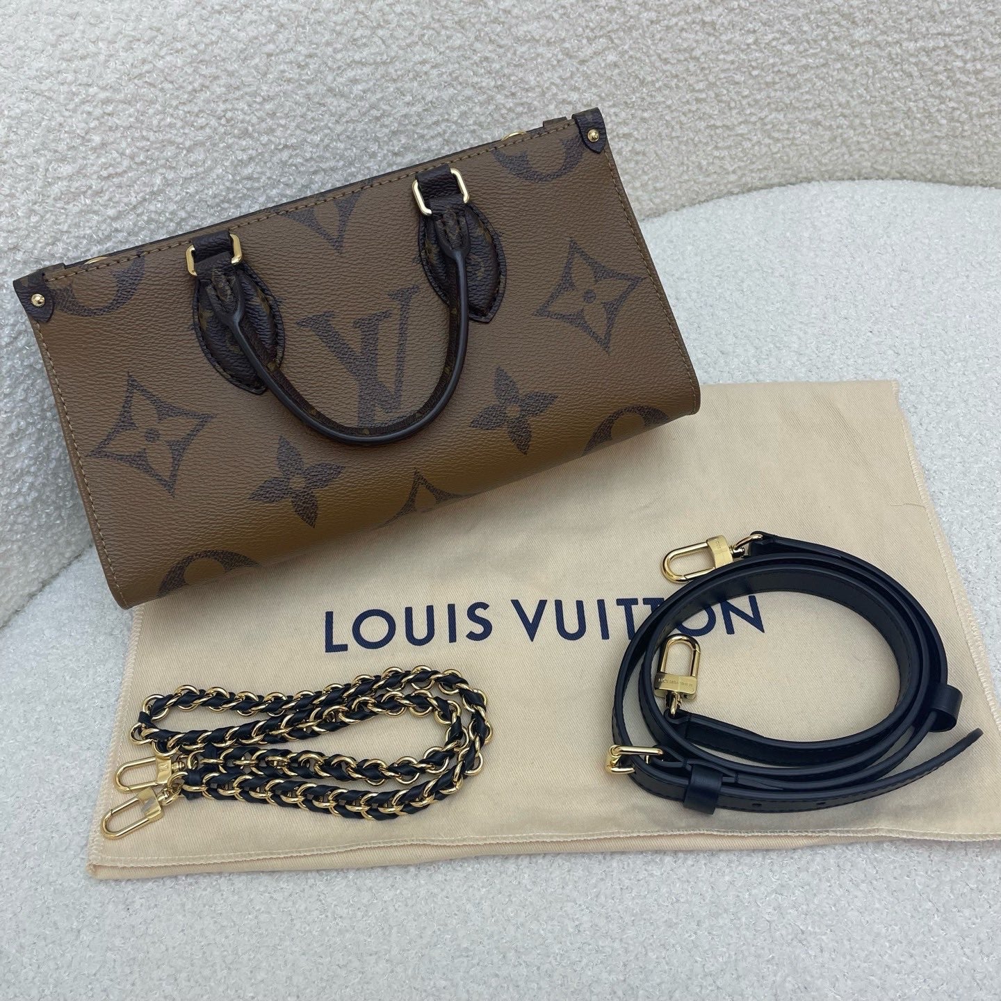 Louis Vuitton OnTheGo East West Chain Two-way Handbag