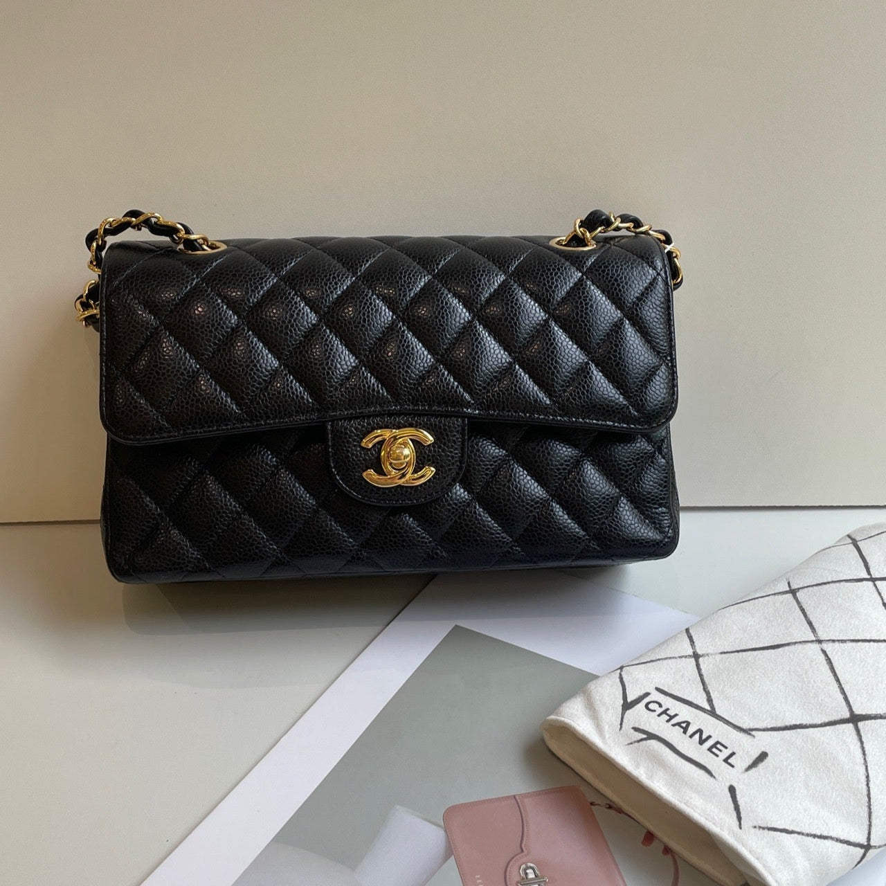 Chanel Small Classic Flap Black Caviar Leather with Gold Hardware