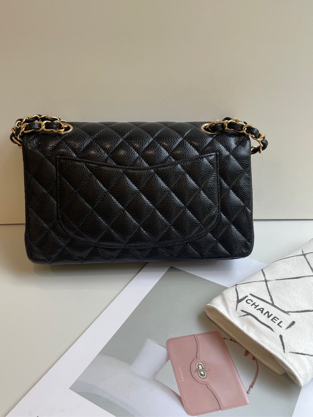 Chanel Small Classic Flap Black Caviar Leather with Gold Hardware
