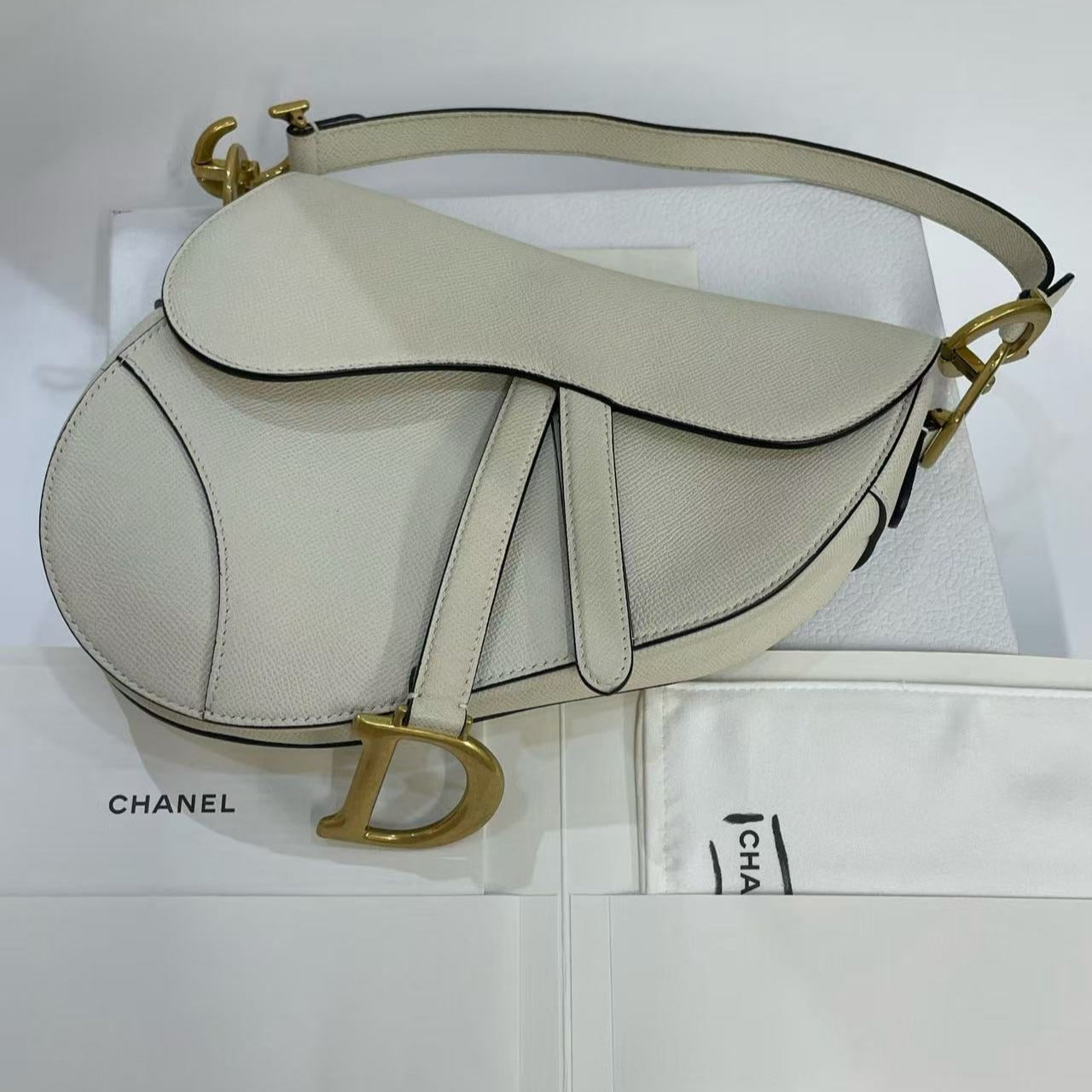 Dior saddle small white lychee cowhide gold buckle